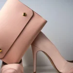 Elegant pink high heels and matching clutch bag for women's evening fashion and style coordination