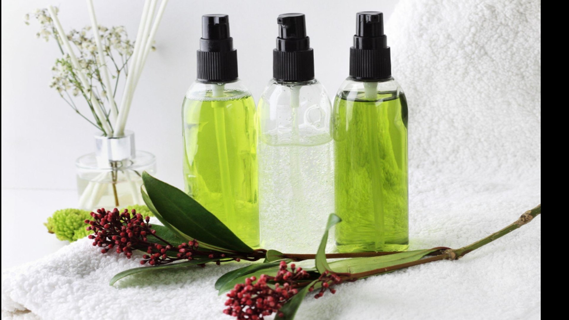 Henry Rose clean fragrance ingredients featuring eco-friendly perfume bottles and natural botanicals